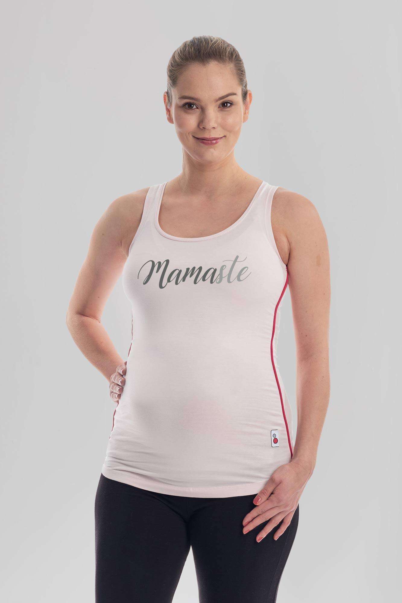 White Mamaste Maternity Yoga Top by FittaMamma featuring side seams and slogan design, perfect for stylish and supportive prenatal yoga sessions.